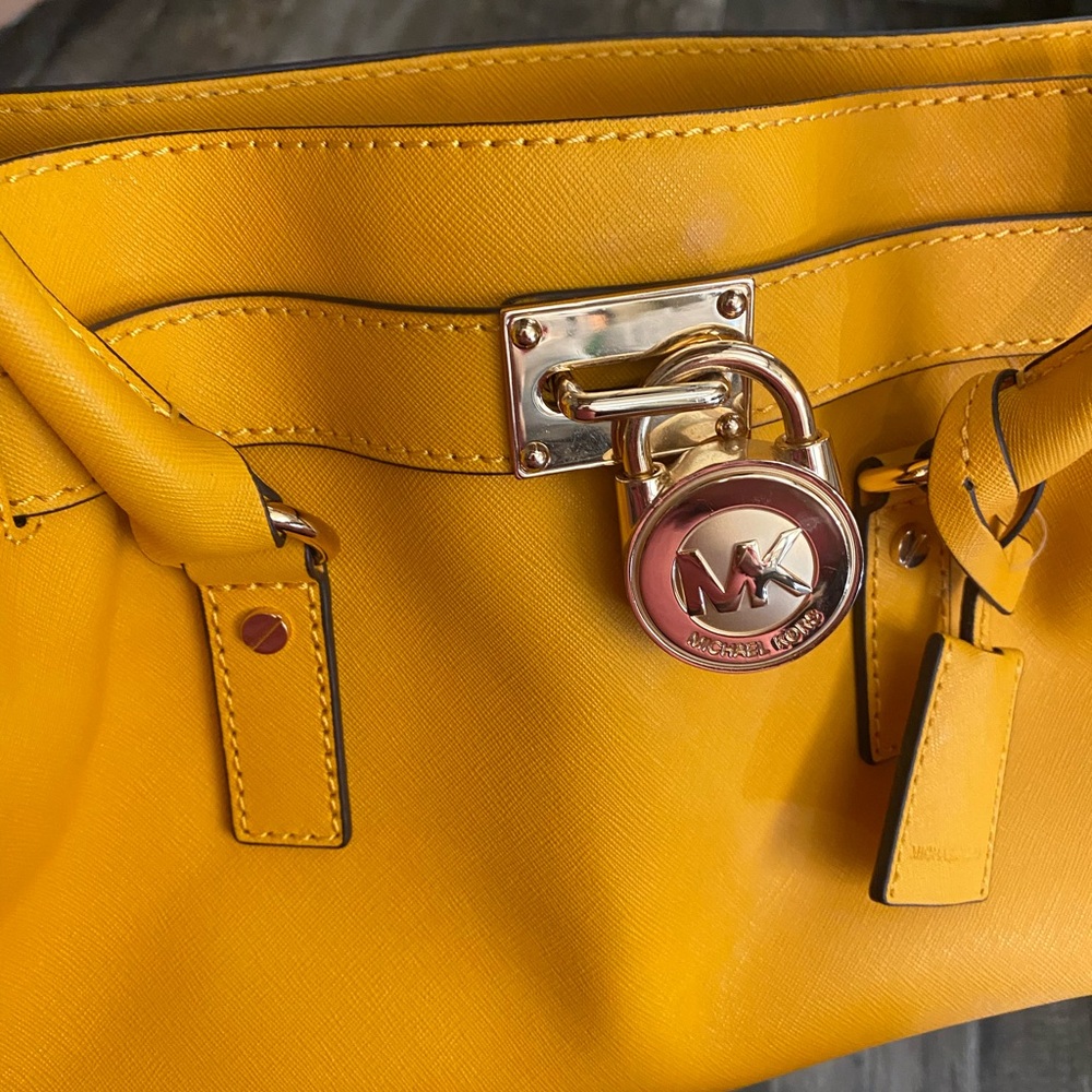 BOTH. Michael Kors Vibrant Yellow Satchel and Michael Kors Blue and tan satchel